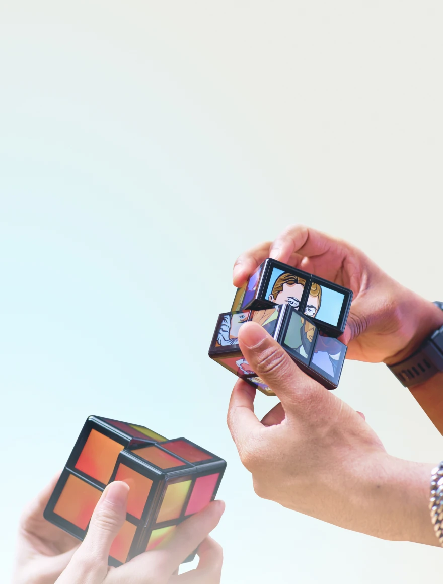 WOWCubes in people's hands