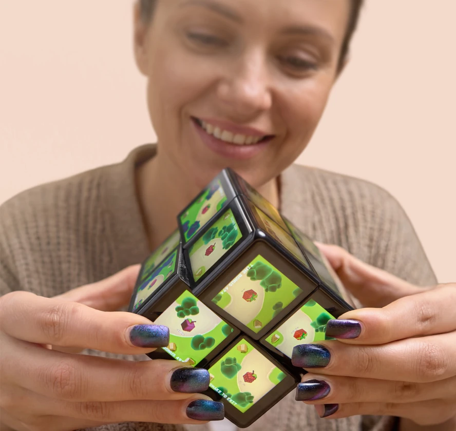 Woman playing with WOWCube
